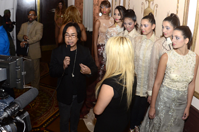 Designer Barge Ramos does a TV interview at Couture Fashion Week in New York