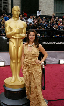 Actress Michelle Romano wears a Shekhar Rehate gown at the 2012 Academy Awards in Hollywood